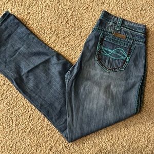 Cowgirl Tuff Women’s Jeans with teal stitching. Size 29 length 33